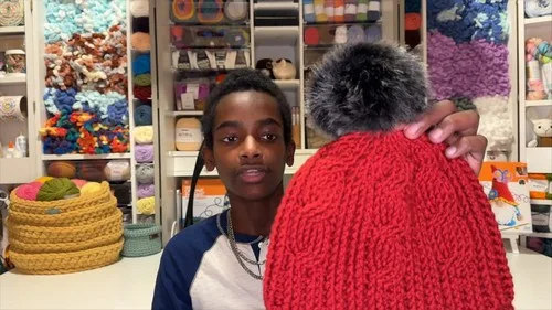 Cable ribbed hat with front post cables and pom pom — photo 2