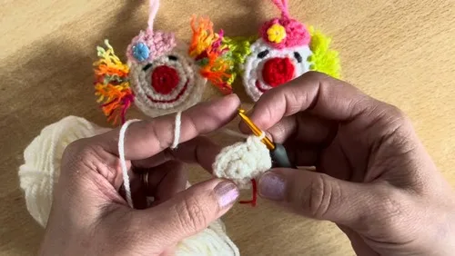 Crochet clown head with hat, hair and nose details — photo 4