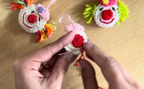 Crochet clown head with hat, hair and nose details — photo 5