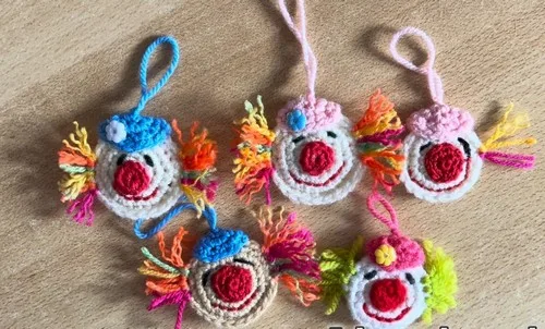 Crochet clown head with hat, hair and nose details