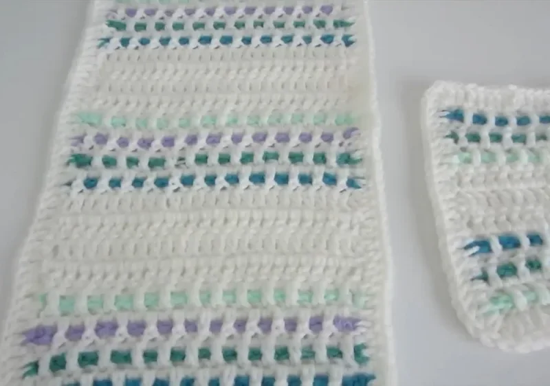 Easy double crochet blanket with woven accent trim