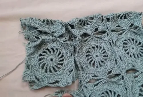 A granny square jacket built from simple motifs — photo 3