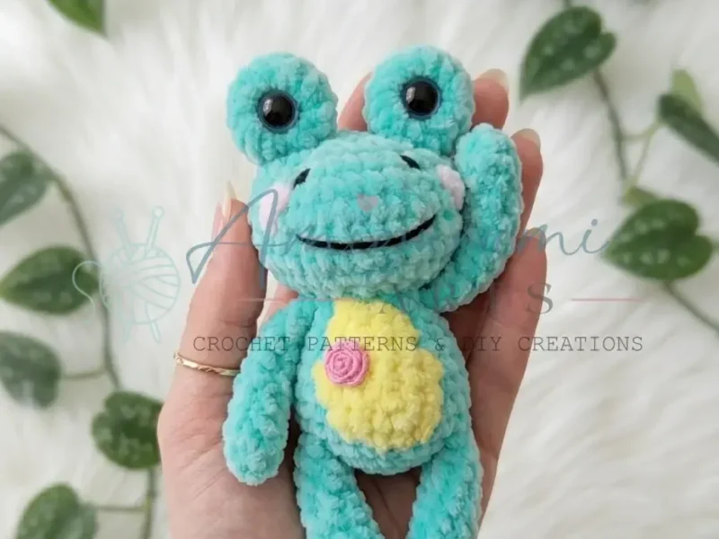 Crochet frog amigurumi pattern in plush yarn