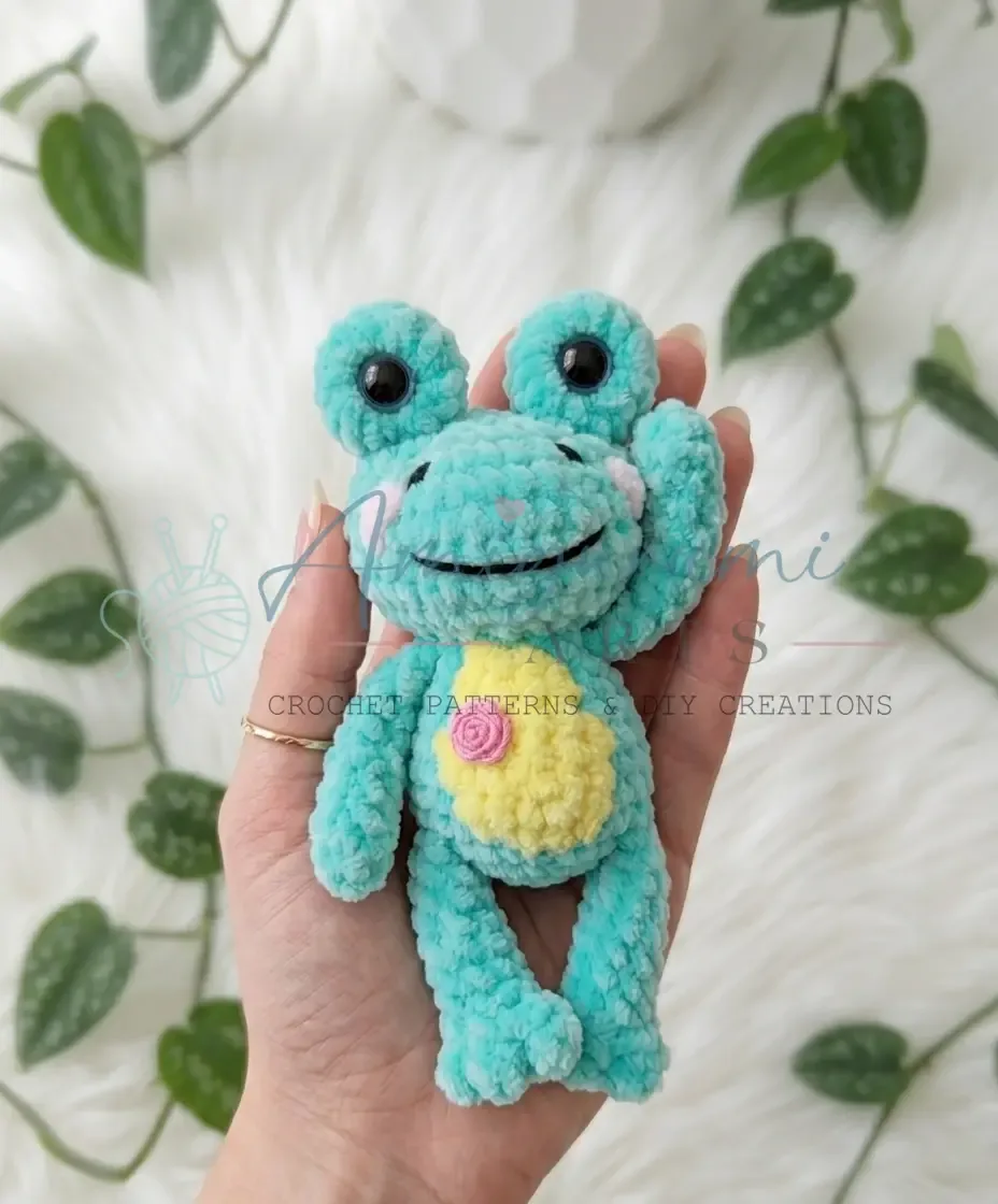 Crochet frog amigurumi pattern in plush yarn
