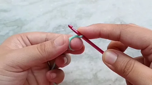 How to crochet a mini octopus amigurumi keychain — photo 6