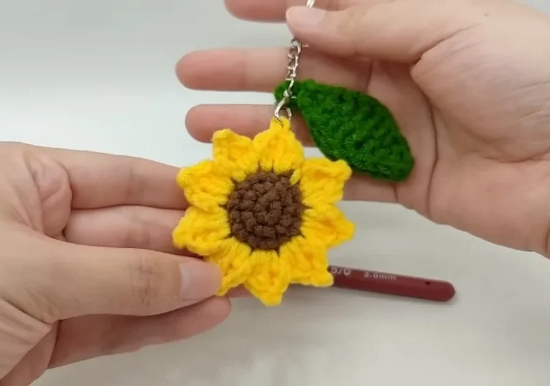 Crochet sunflower keychain pattern with petal and leaf shaping