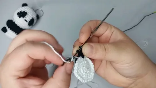 A compact panda amigurumi keychain worked in six rounds — photo 4