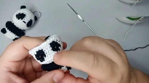 A compact panda amigurumi keychain worked in six rounds — photo 5