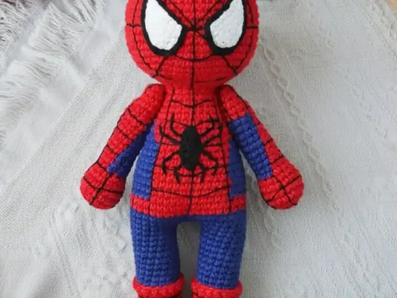 A realistic Spiderman amigurumi worked in single crochet