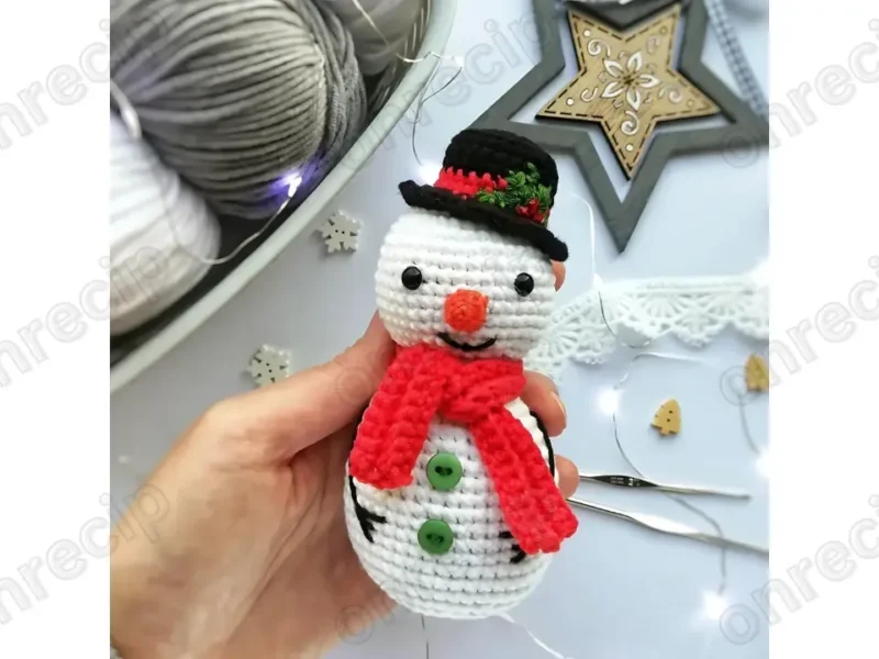 Snowman amigurumi crochet pattern with hat and scarf